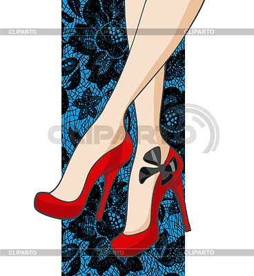 Красивые стройные женские ноги в красных туфлях и мини