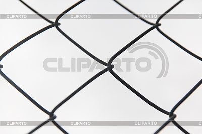 Mesh fence over gray sky | High resolution stock photo |ID 5157840