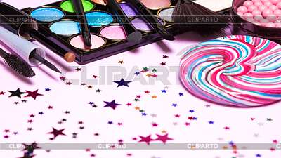 Holiday party makeup cosmetics with lollipop and | High resolution stock photo |ID 6259381