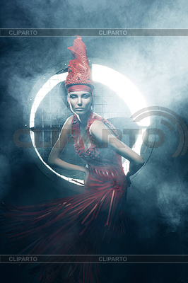 Woman in red in circle of light | High resolution stock photo |ID 4768805