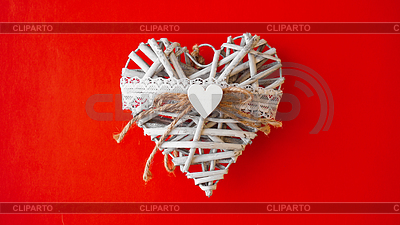 White heart on red background with copy space. | High resolution stock photo |ID 7150408
